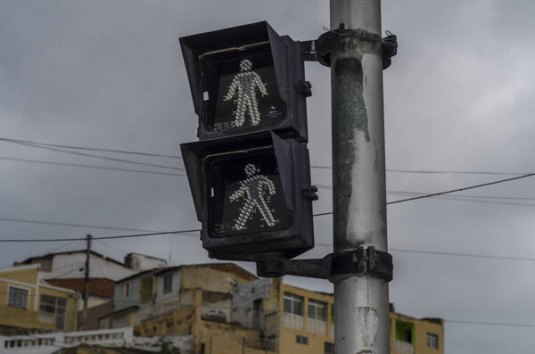 Closeup view of traffic light on the street of the old town