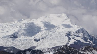 Alpamayo snowy mountain located in Cusco, Peru clipart