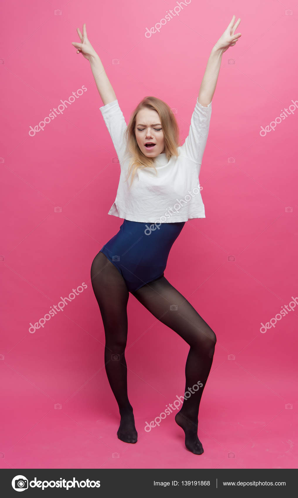 Girl in black tights dancing on a pink background Stock Photo by ©raduga21  139191868