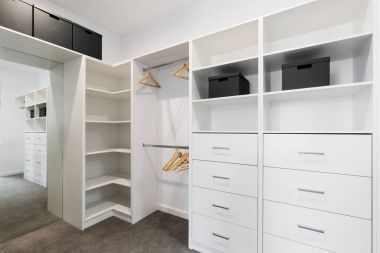 Large walk in wardrobe cabinetry details