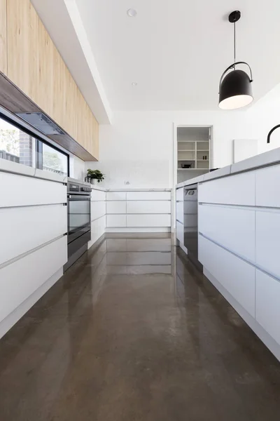 Long galley style kitchen — Stock Photo, Image