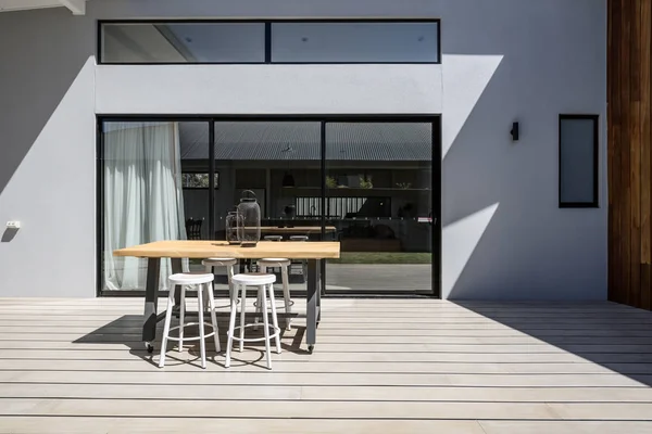 Sunny outdoor entertaining deck