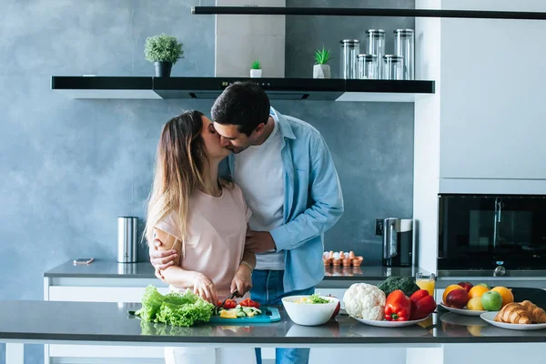 Happy Young Couple Embracing Breakfast Kitchen — Stock Photo, Image