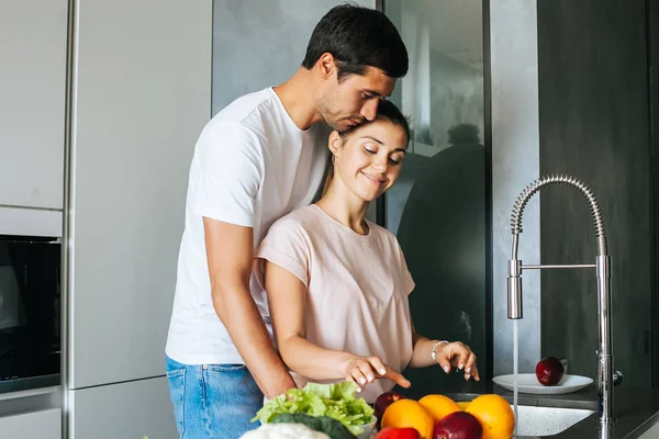 Happy Young Couple Embracing Breakfast Kitchen — Stock Photo, Image