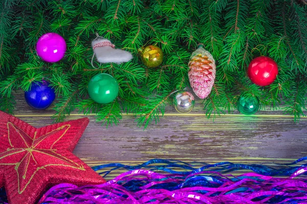 Fir branches on a wooden table. — Stock Photo, Image