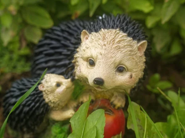 garden figure of a hedgehog in the grass, Russia