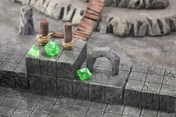 A close up of a gaming set up for a Dungeons and Dragons type role playing game.