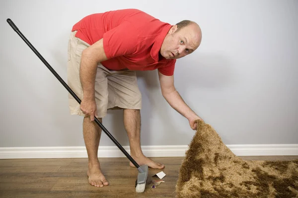 Sweep under the carpet Stock Photos, Royalty Free Sweep under the ...