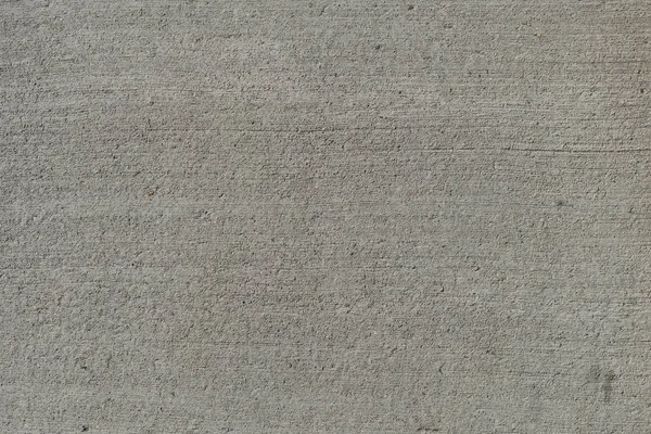 Pared de hormigón gris, la textura se puede utilizar para el diseño de interiores. Textura áspera abstracción de fondo de yeso. Textura de fondo de pared de hormigón usado al aire libre — Foto de Stock