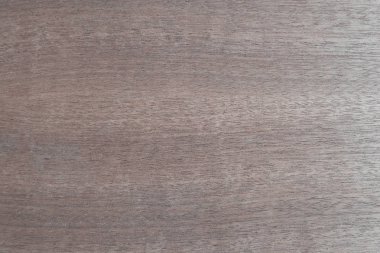 Açık kahverengi, ahşap kaplamalı arka plan. Döşeme: pürüzsüz ahşap, ceviz, kül, kayın, meşe, armut. Paneller için vener kaplama.