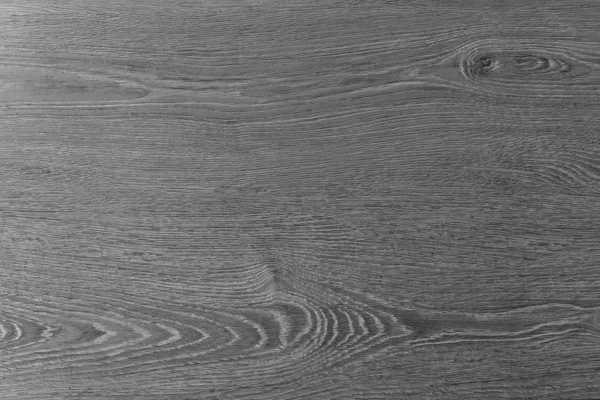 Czarna monochromatyczna drewniana deska. Tło drewniany nowy gładki laminat. Tekstura drewnianej podłogi. — Zdjęcie stockowe
