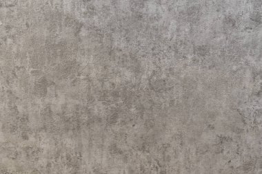 Beige concrete wall with a smooth surface textural. Brown leather texture look. Gray surface for design background texture.