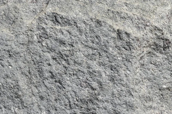 Muro di grigio intero pezzo di pietra di granito. La consistenza della pietra naturale. Sfondo per il progettista texture pezzo . — Foto Stock