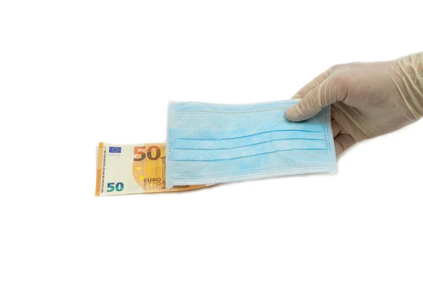 Hand Protective Gloves Holds Out Blue Medical Mask Euro Money Royalty Free Stock Images