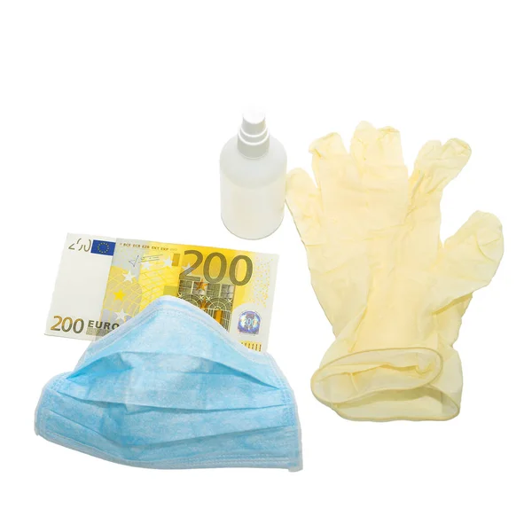 青いマスクは 200 200 200ユーロの防腐剤とお金を持つ黄色の保護医療用手袋です ウイルスから保護するためのアイテムを購入するという概念 隔離された背景 — ストック写真