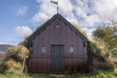 Grafarkirkja turf church - the Chapel at Grf in Hfastrnd in North-Iceland - is Iceland`s oldest turf church. Parts of the current turf church date back to the 17th century. There is a weather-vane on top of the church with the letters 167 clipart