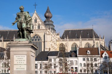 ANTWERP, BELGIUM - FEBRUARY 6, 2020: Statue of Petro Paulo Rubens with the cathedral of Antwerp in the background on February 6, 2020 in Belgium