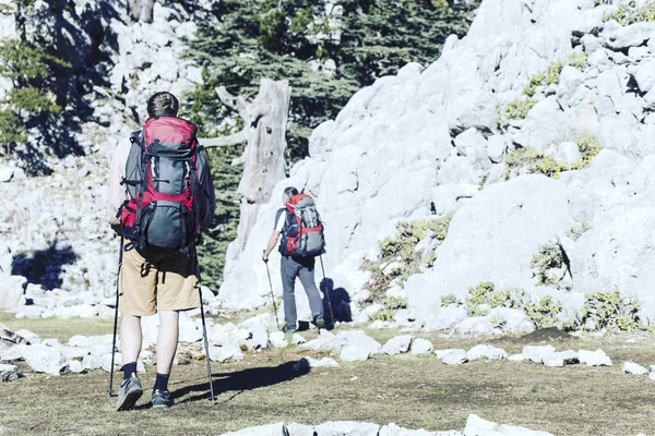 Summer hiking.Summer hiking in the mountains with a backpack and tent.