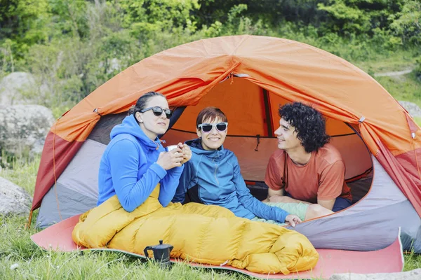 Group Of Friends Relaxing Outside Tents On Camping Holiday. — Stock Photo, Image