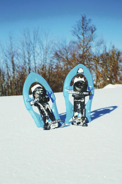 Winter hiking in the mountains. Snowshoes in snow with beautiful — Stock Photo, Image