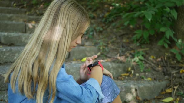 Smart Watch Kid Using Smartwatch Child Talking Smartphone Teenager Girl — Stock video