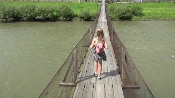 Kid on Bridge in Mountains, Child Hiking in Nature, Girl Looking a River, Stream — Stock Video