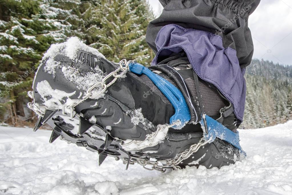 Crampons on hiking boot