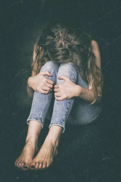 Shy girl in the corner — Stock Photo, Image