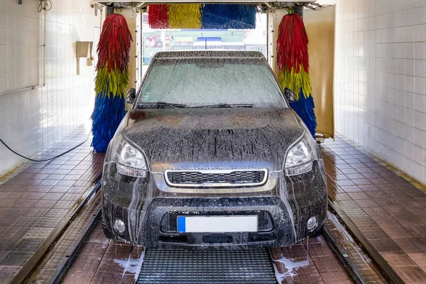 Foam on car at carwash — Stock Photo, Image