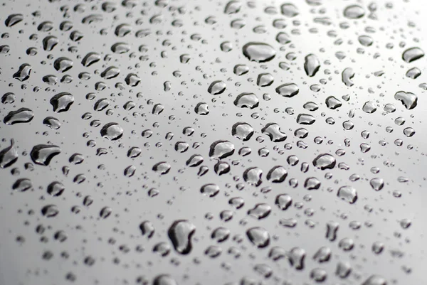 Water drops on surface — Stock Photo, Image