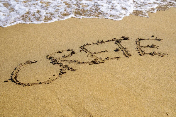 Text CRETE written in sand — Stock Photo, Image