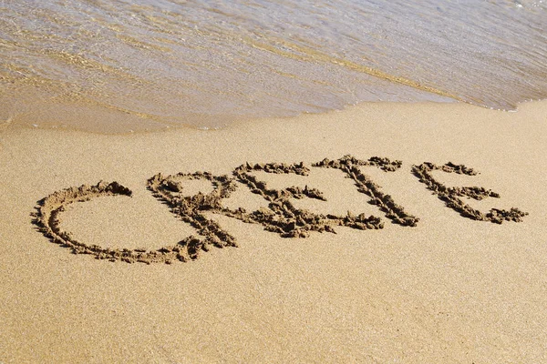 Text CRETE written in sand — Stock Photo, Image