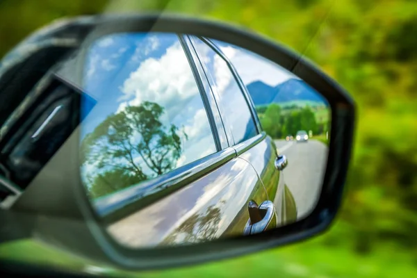 Reflection in wing mirror — Stock Photo, Image