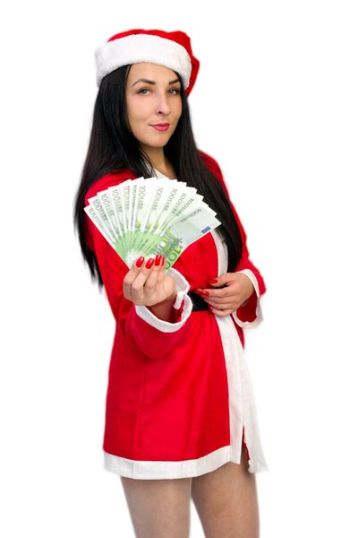 Girl in Santa costume with euros in hand