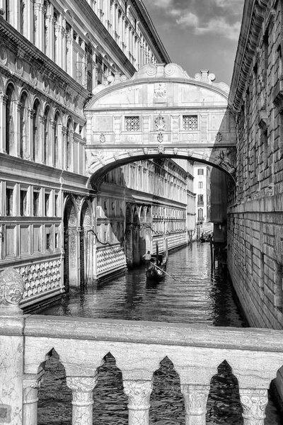 VENICE, ITALY - FEBRUARY 11: Bridge of Sighs and gondola in water canal on February 11, 2018 in Venice