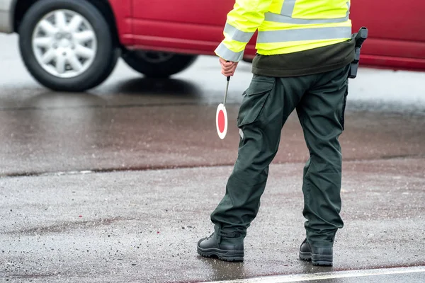 Traffic cop with stop sign — Stock Photo, Image