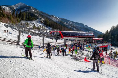 Cableway station and skiers at resort Chopok Juh in Low Tatras m