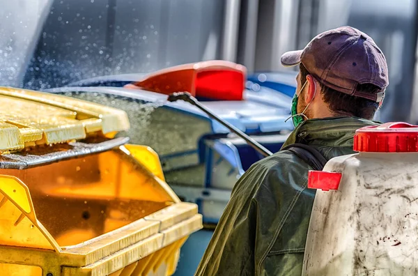 Spraying Disinfecting Trash Cans Man Due Coronavirus Covid — Stock Photo, Image
