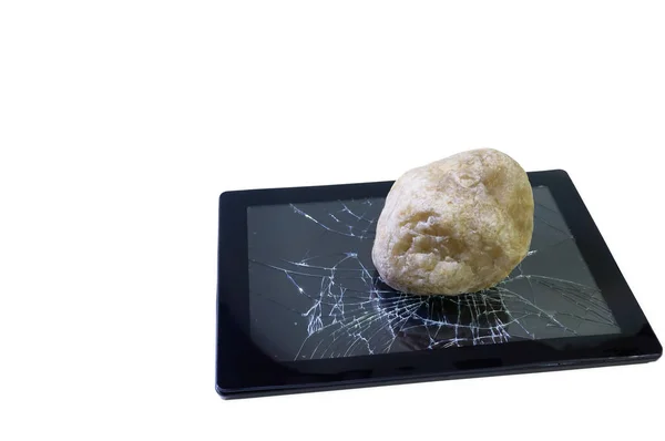Tarafsız beyaz zemin üzerine detaylı yakın çekim shot olarak kırık tablet bilgisayar