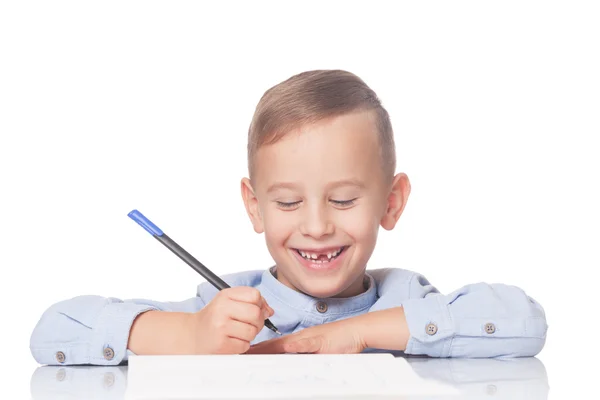 Gelukkig kind met een pen — Stockfoto