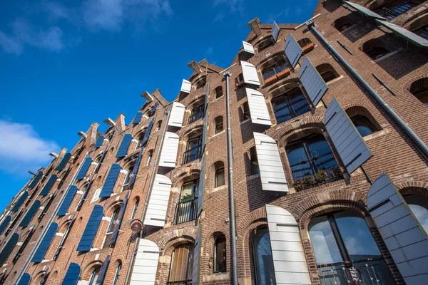 Bakgrund av gamla lager i Amsterdam, Nederländerna — Stockfoto