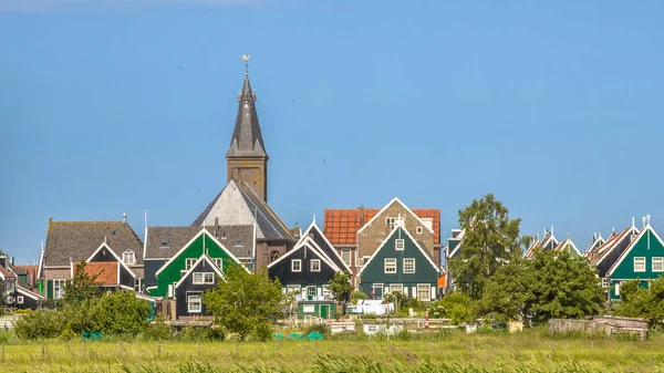 Traditional dutch Village with with colorful houses and church — Stock Photo, Image