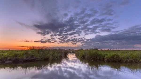 Sunset over waterway split — Stock Photo, Image