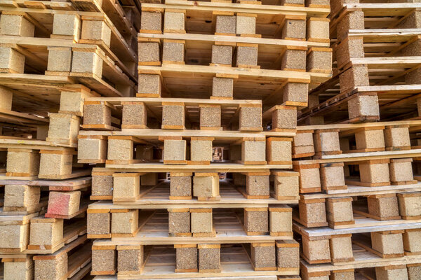 Close up Piles of pallet on business area in HDR