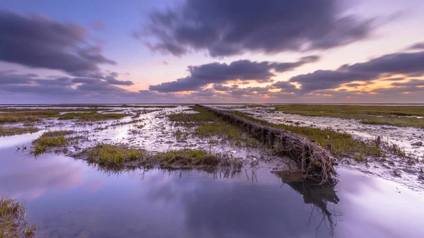ユネスコ世界遺産ワッデン海潮沼に沈む夕日 — ストック写真