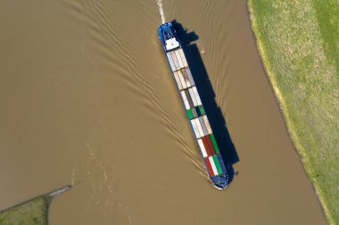 Cargo vessel River Lek aerial view clipart