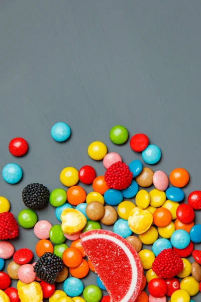 Colorful candies and lollipops. Top view with copy space — Stock Photo, Image