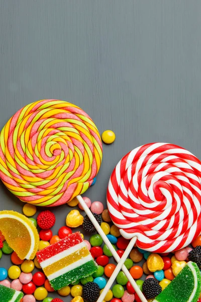 Candies mix on wooden background — Stock Photo, Image