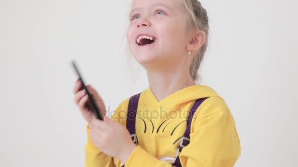 Child Playing on a Touchscreen Phone, Smartphone, Children — Stock Video