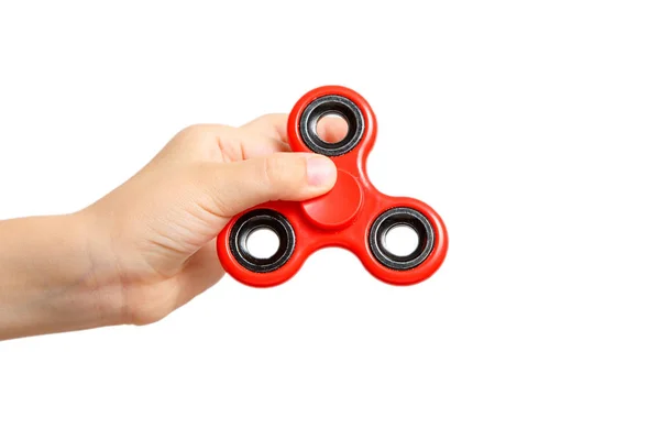 Menina mão segurando popular fidget spinner brinquedo — Fotografia de Stock